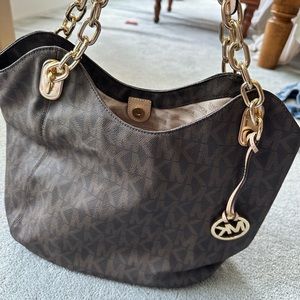 Michael Kors monogrammed hobo bag